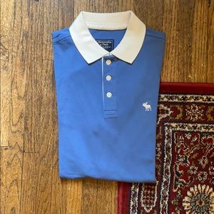 Blue polo shirt with white trims